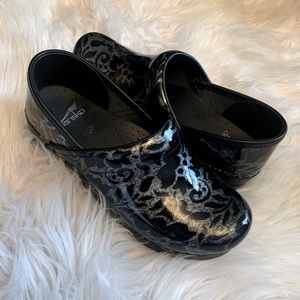 Dansko clogs, never worn.